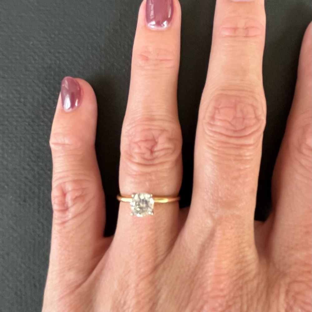 .9 carat solitaire diamond. Set in platinum with a 14k yellow gold band.